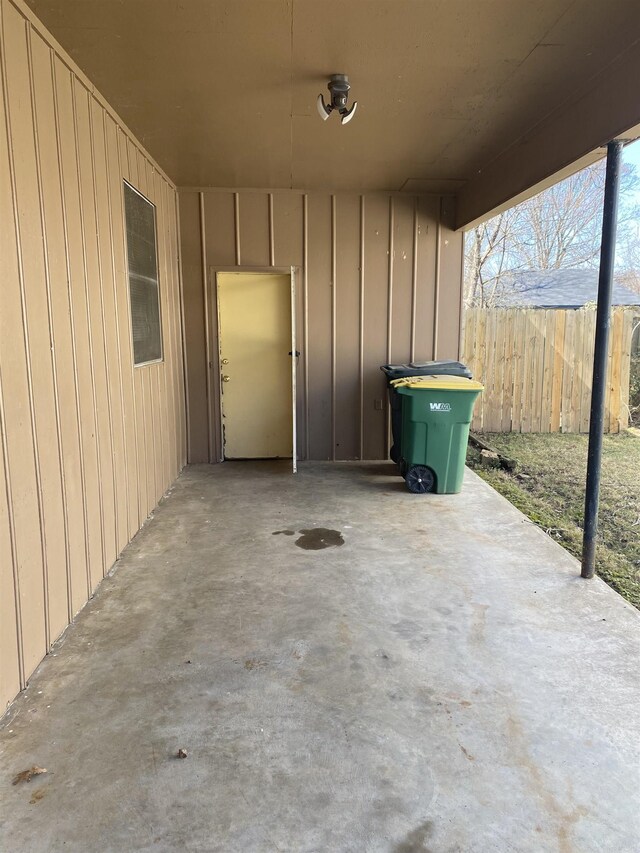 view of patio featuring fence