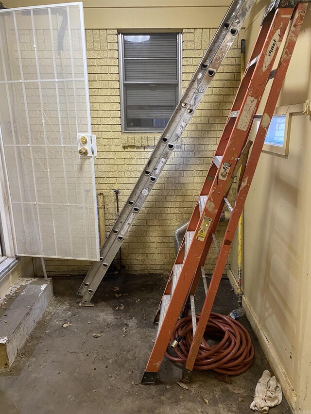 interior space with brick wall