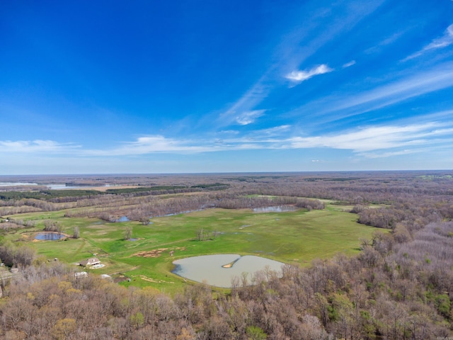 drone / aerial view with a water view and golf course view