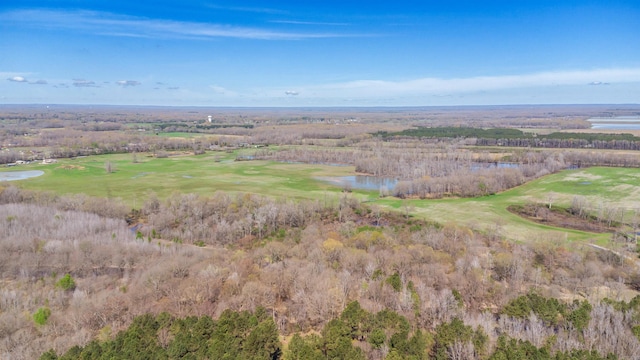 aerial view featuring golf course view and a water view