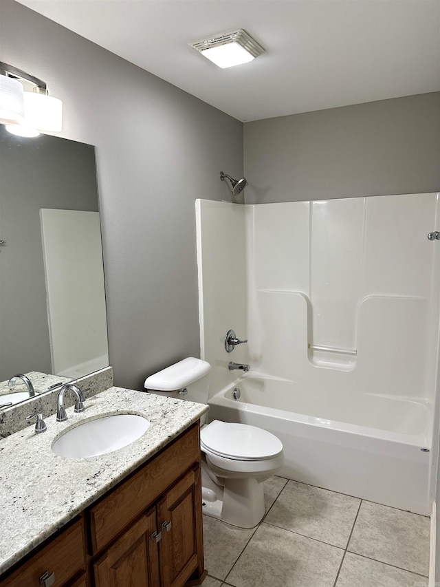 bathroom featuring visible vents, toilet, tile patterned flooring, vanity, and shower / bathing tub combination