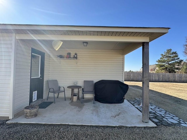 view of patio / terrace with fence and grilling area