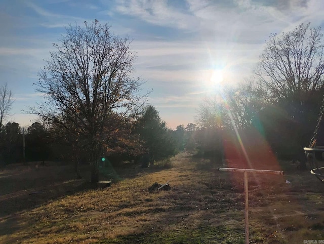 view of yard at dusk