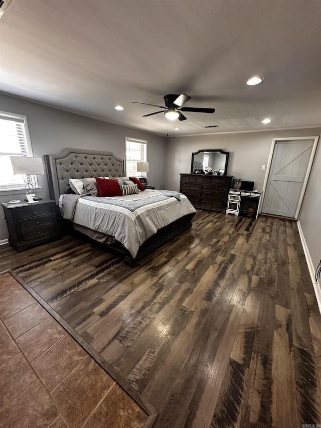 bedroom featuring a ceiling fan, recessed lighting, dark wood-style flooring, and baseboards