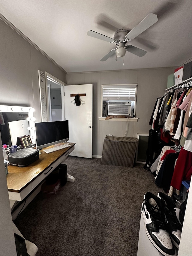 office area featuring cooling unit, dark colored carpet, and a ceiling fan