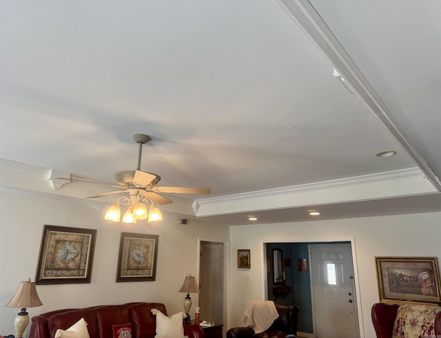 living room with ceiling fan, recessed lighting, visible vents, and crown molding