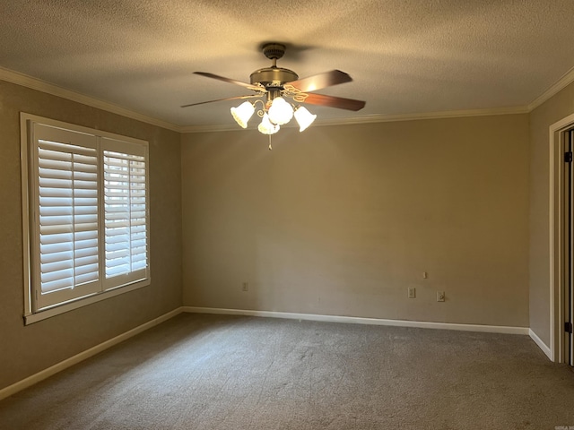 unfurnished room featuring ceiling fan, baseboards, crown molding, and carpet flooring