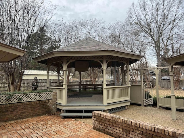 view of community featuring a gazebo and fence