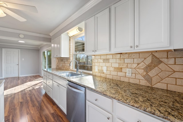 kitchen featuring ornamental molding, white cabinets, a sink, light stone countertops, and dishwasher