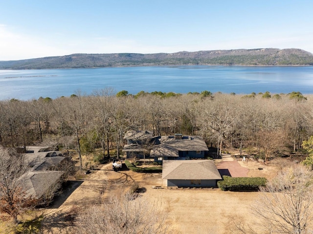 bird's eye view with a water and mountain view