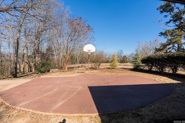 exterior space featuring community basketball court