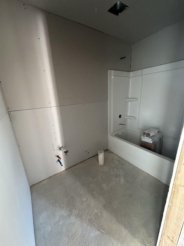 bathroom featuring concrete floors