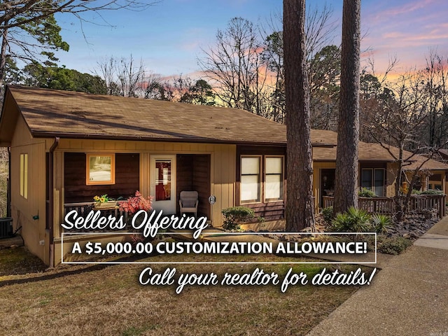 single story home featuring covered porch and central AC