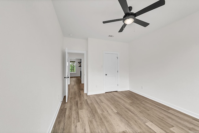 47 Wellington Pl, Cabot, AR 72023 - empty room featuring light wood-type flooring, ceiling fan, and baseboards