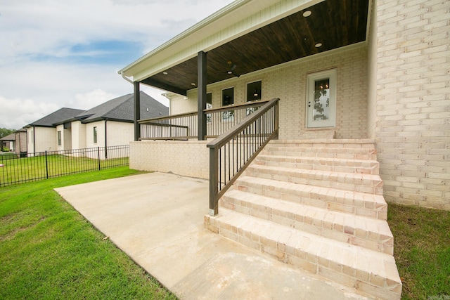 47 Wellington Pl, Cabot, AR 72023 - doorway to property featuring brick siding and a patio area