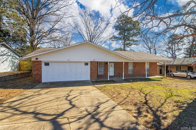 ranch-style home featuring a garage, driveway, brick siding, and a front lawn