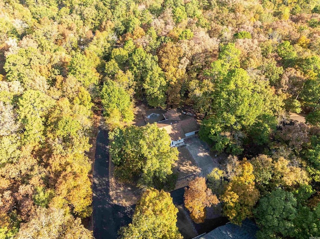 aerial view featuring a view of trees