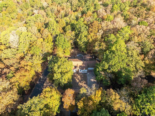 bird's eye view featuring a forest view