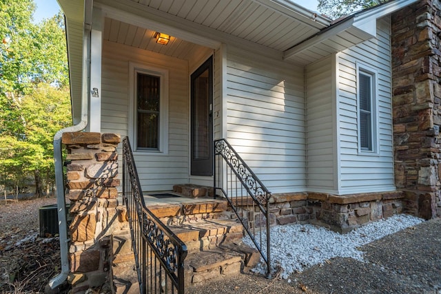 doorway to property with central AC