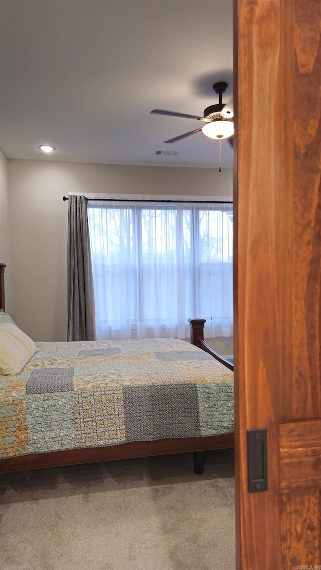 carpeted bedroom with recessed lighting, visible vents, and ceiling fan