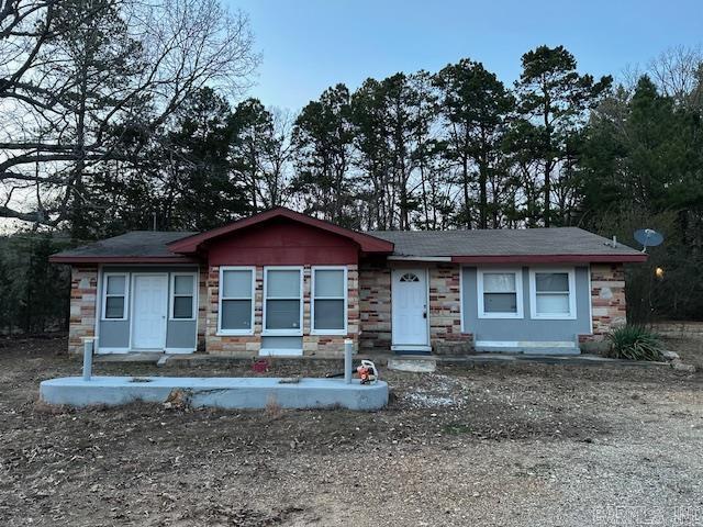 view of front of home featuring stone siding