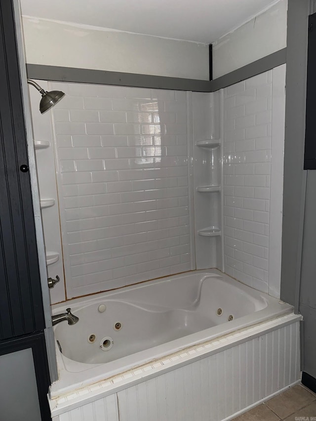 full bathroom featuring a combined bath / shower with jetted tub and tile patterned floors