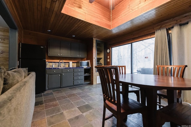 201 Lazy Ln, Hot Springs, AR 71913 - dining space featuring wooden walls, wooden ceiling, and stone finish flooring