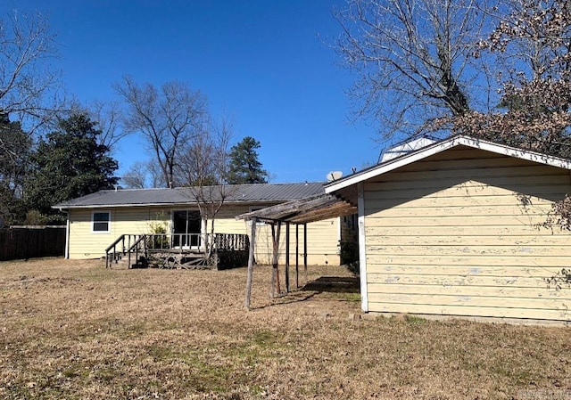 860 Ash St, Prescott, AR 71857 - back of house featuring a deck and a yard