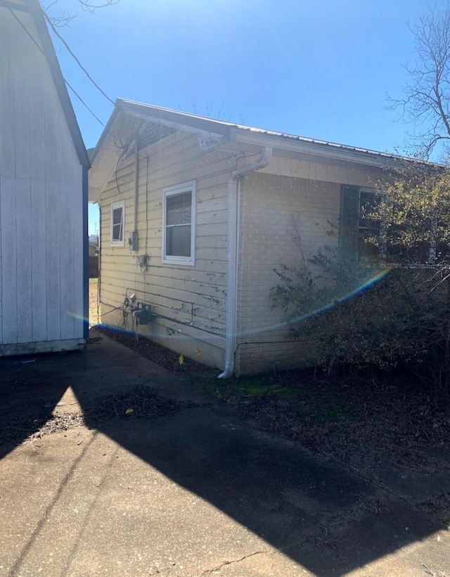 860 Ash St, Prescott, AR 71857 - view of home's exterior featuring brick siding
