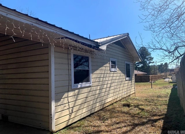 860 Ash St, Prescott, AR 71857 - view of home's exterior with a lawn and fence
