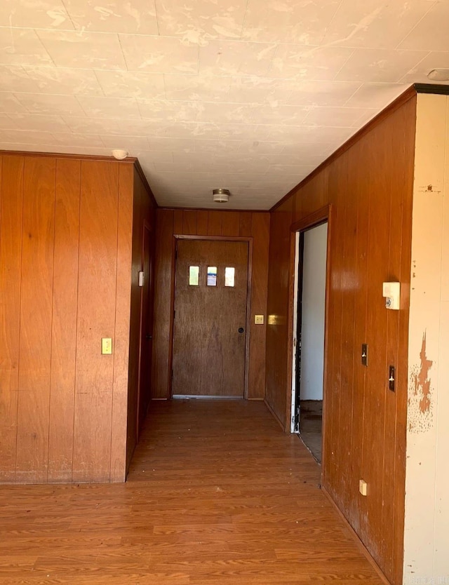 860 Ash St, Prescott, AR 71857 - hall with wooden walls and wood finished floors