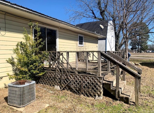 860 Ash St, Prescott, AR 71857 - exterior space featuring central AC and stairway