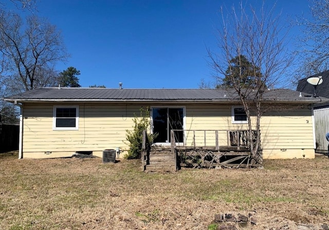860 Ash St, Prescott, AR 71857 - back of house with cooling unit, crawl space, metal roof, and a lawn