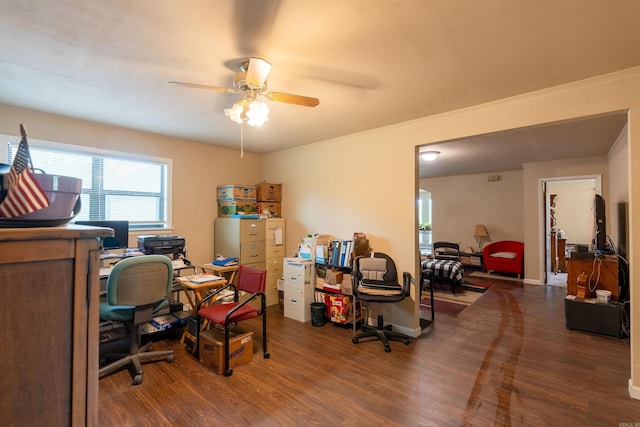 home office with wood finished floors and a ceiling fan