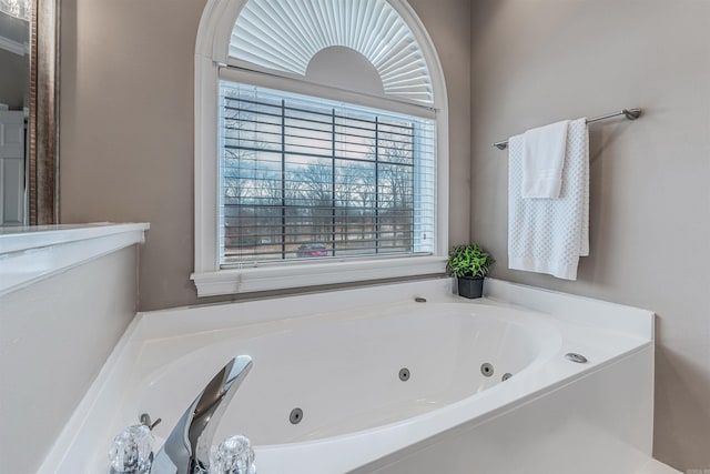 full bath featuring a whirlpool tub