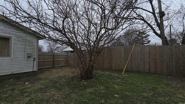 view of yard with a fenced backyard