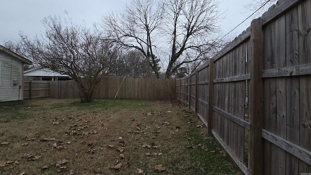 view of yard featuring a fenced backyard