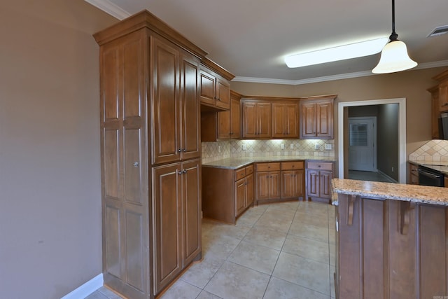 kitchen with crown molding, decorative backsplash, and pendant lighting