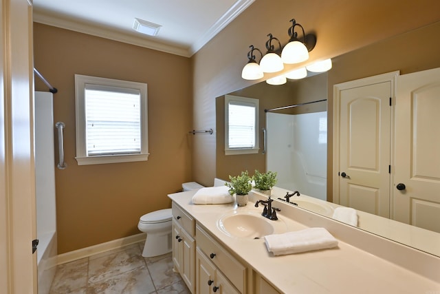 bathroom with a wealth of natural light, visible vents, crown molding, and baseboards