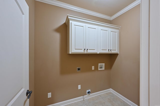 laundry room with hookup for a washing machine, cabinet space, ornamental molding, electric dryer hookup, and baseboards