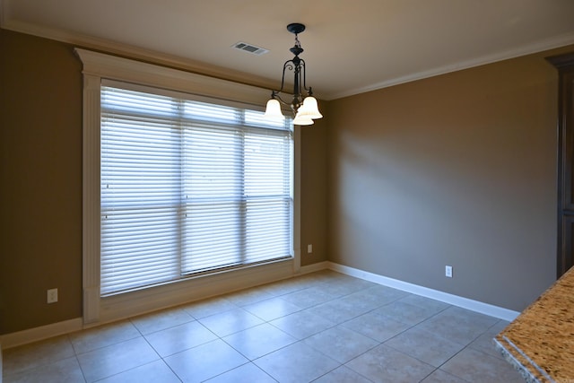 unfurnished dining area with crown molding, a notable chandelier, visible vents, light tile patterned flooring, and baseboards