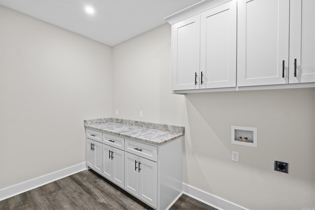 laundry area featuring hookup for a washing machine, hookup for an electric dryer, baseboards, cabinet space, and dark wood-style floors