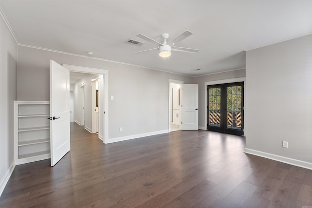 unfurnished room featuring dark wood-style floors, french doors, visible vents, and crown molding