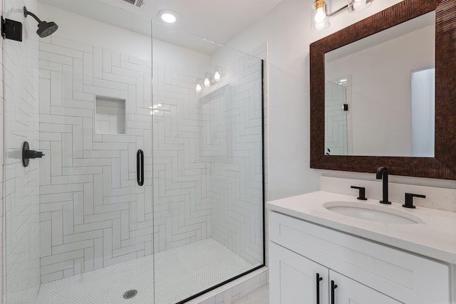 full bath featuring a shower stall and vanity