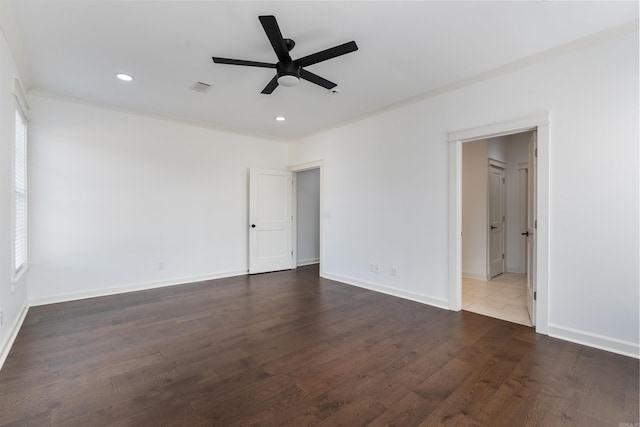 interior space with dark wood-type flooring, recessed lighting, visible vents, and baseboards