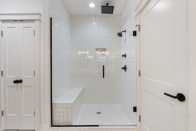 bathroom with a shower stall