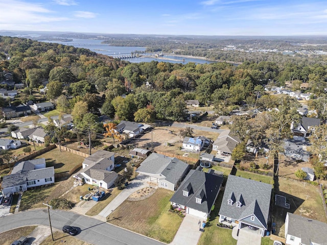 bird's eye view featuring a residential view and a water view