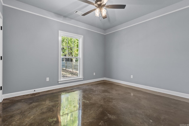 unfurnished room with finished concrete floors, visible vents, baseboards, and a ceiling fan