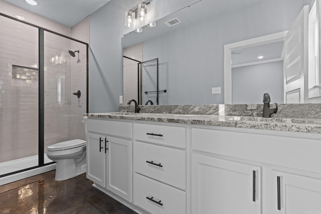 full bathroom featuring toilet, a stall shower, visible vents, and a sink