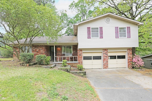 split level home featuring brick siding, covered porch, a garage, driveway, and a front lawn